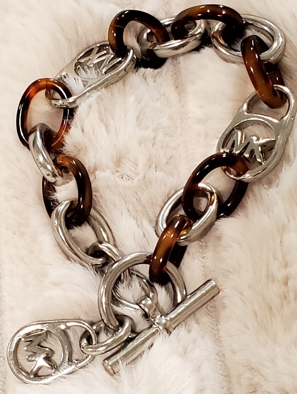 Mickael Kors Silver Tone MK Lock and Tortoise Chunky Link Bracelet With Toggle